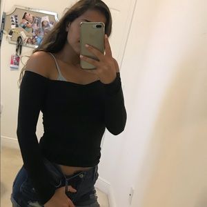 Off the shoulder long sleeve shirt.